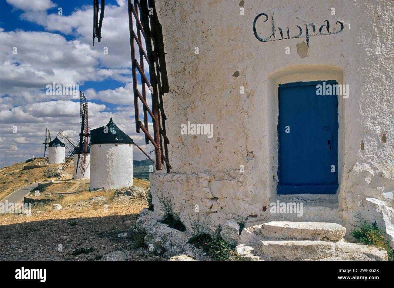 Windmill named Chispas at Cresteria Manchega hill near Consuegra, Castilla–La Mancha, Spain Stock Photo