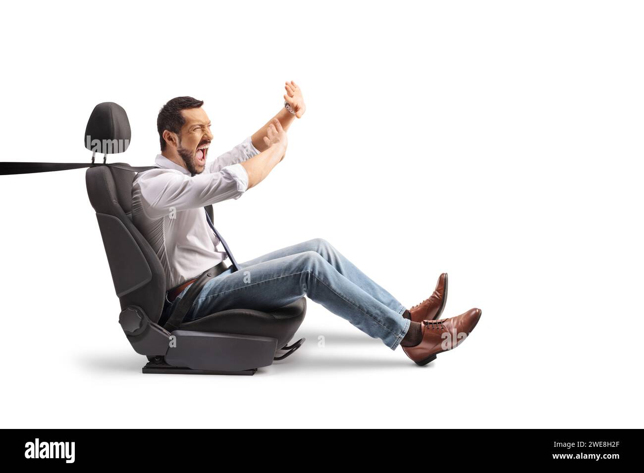 Shocked passenger in a car seat protecting himself from a crash