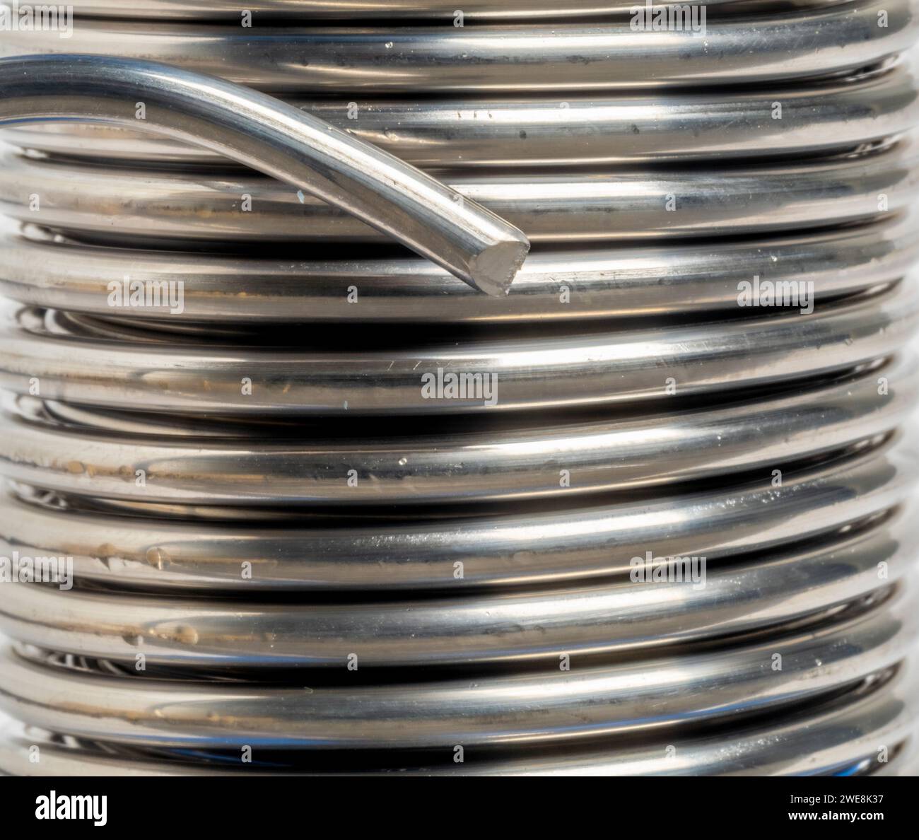 Close-up of a reel of solder used for plumbing Stock Photo