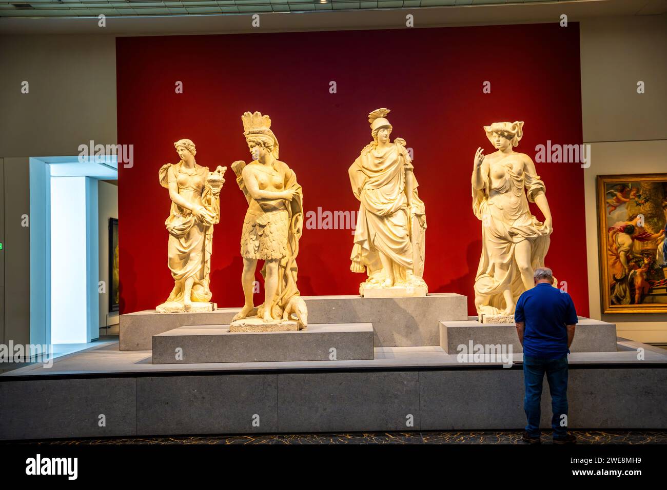 Abu Dhabi, UAE - December 6, 2023: Interior of Louvre and Visitors looking at exhibits, museum in Abu Dhabi, UAE Stock Photo