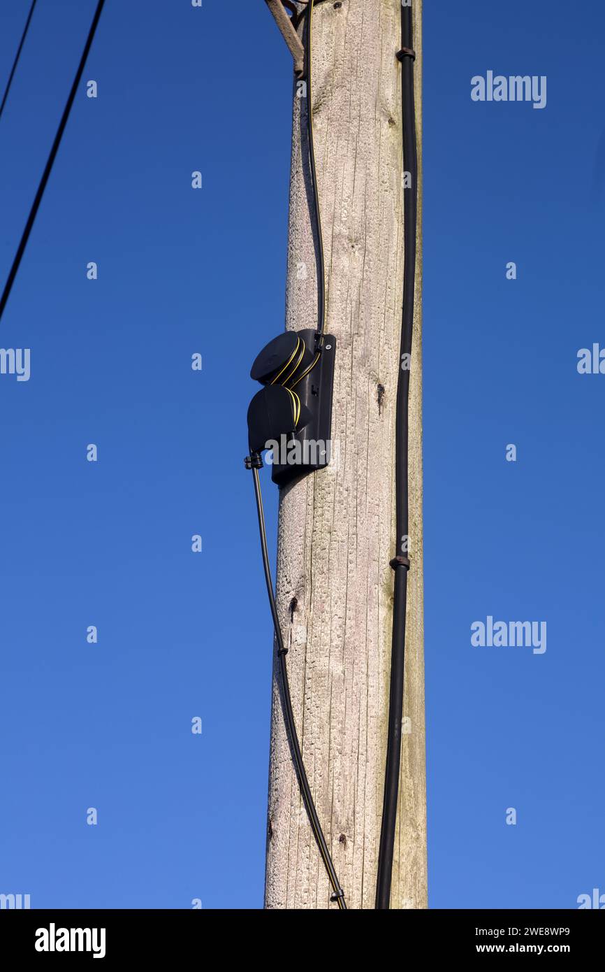 A method of keeping aerial wires tensioned and up on the poles they were attached to and is made of moulded plastic. Stock Photo