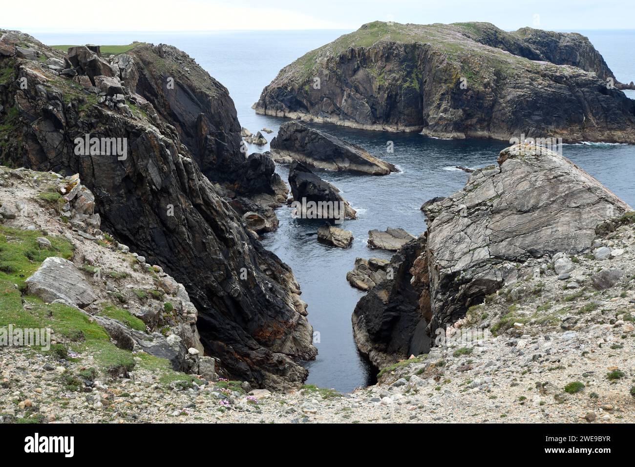 Rugged coast with rock stacks near Mangersta, Isle of Lewis, Outer Hebrides, Scotland Stock Photo