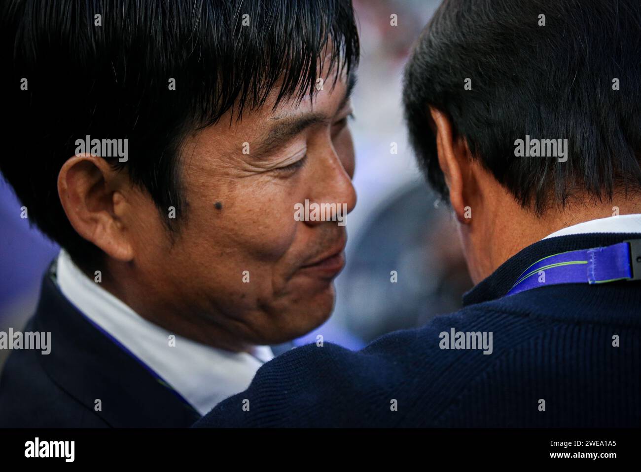Doha, Japan, 24 Jan 2024, AFC Asian Cup Qatar 2023 Group D - Japan beat Indonesia 3-1 in their final Asian Cup Group D game to guarantee a top-two finish, Ayase Ueda scores two goals. Image：Japanese Head Coach Moriyasu Hajime greeting Indonesia Head Coach Shin Tae-yong Stock Photo