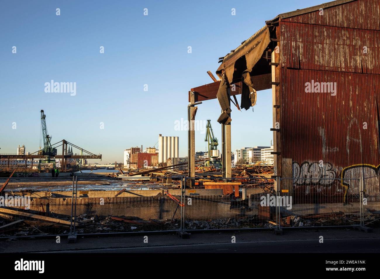 demolition of an old wooden warehouse building of the Thies company in the Rhine harbor in the district Deutz, a new urban quarter will be built here Stock Photo