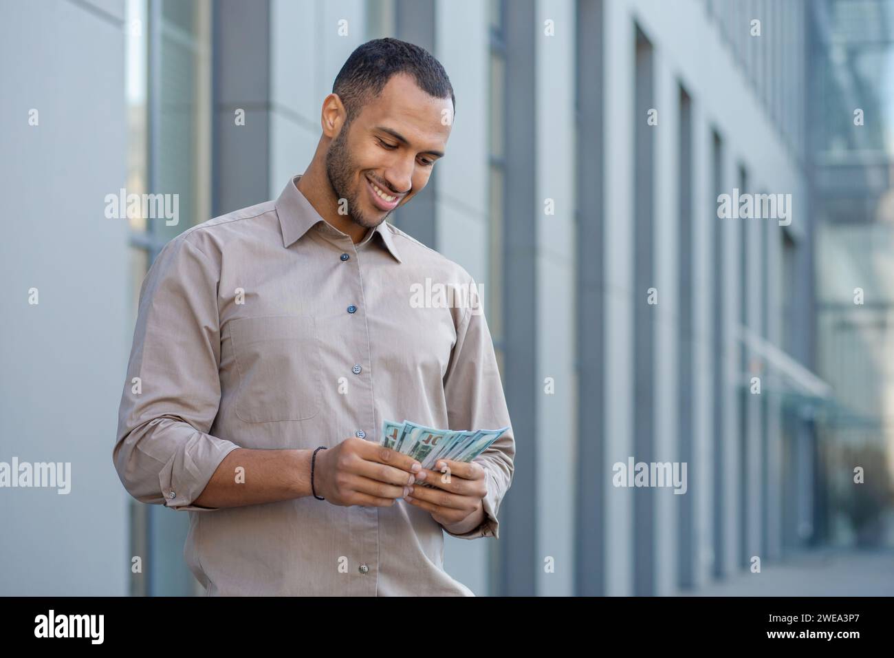 Recieving Income Successful businessman counting money income hi-res stock photography ...