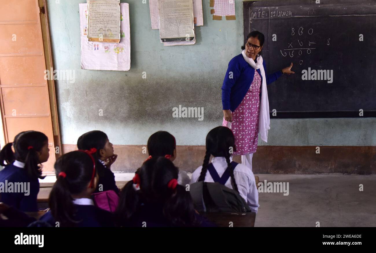 guwahati-guwahati-india-24th-jan-2024-a-teacher-teach-mathematics-as-part-of-the-celebration-international-education-day-at-rupnagar-lower-primary-school-in-guwahati-india-on-wednesday-24th-january-2024-credit-image-dasarath-dekazuma-press-wire-editorial-usage-only!-not-for-commercial-usage!-2WEA6DE.jpg