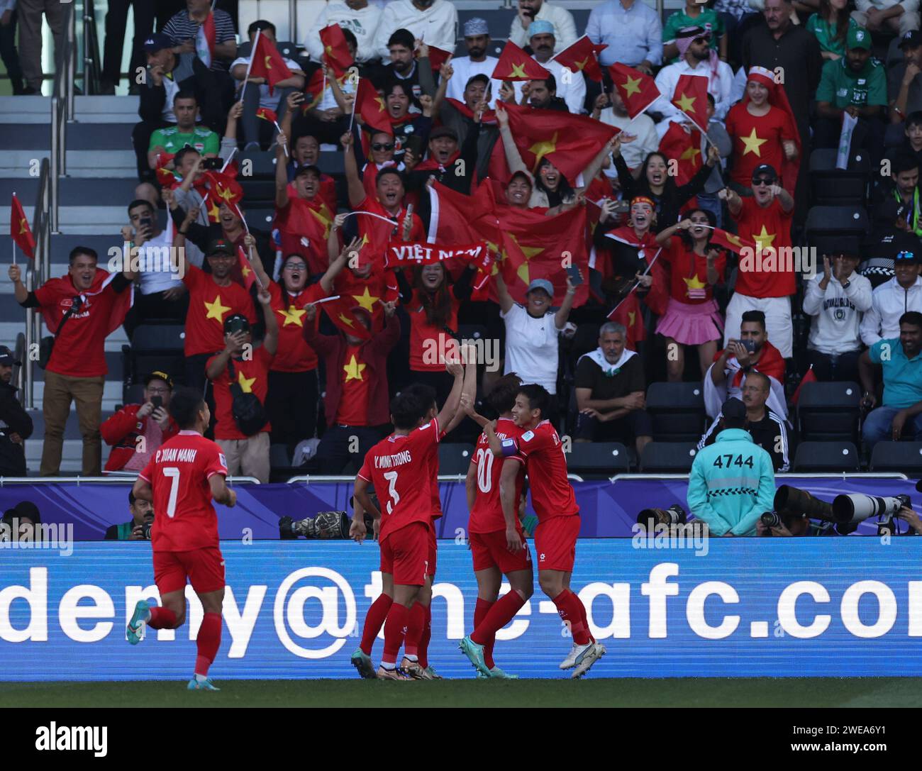 Doha. 24th Jan, 2024. Bui Hoang Viet Anh (2nd R) of Vietnam celebrates scoring with his teammates during the Group D match between Iraq and Vietnam at AFC Asian Cup Qatar 2023 at Jassim Bin Hamad Stadium in Doha, Qatar, Jan. 24 2024. Credit: Jia Haocheng/Xinhua/Alamy Live News Stock Photo
