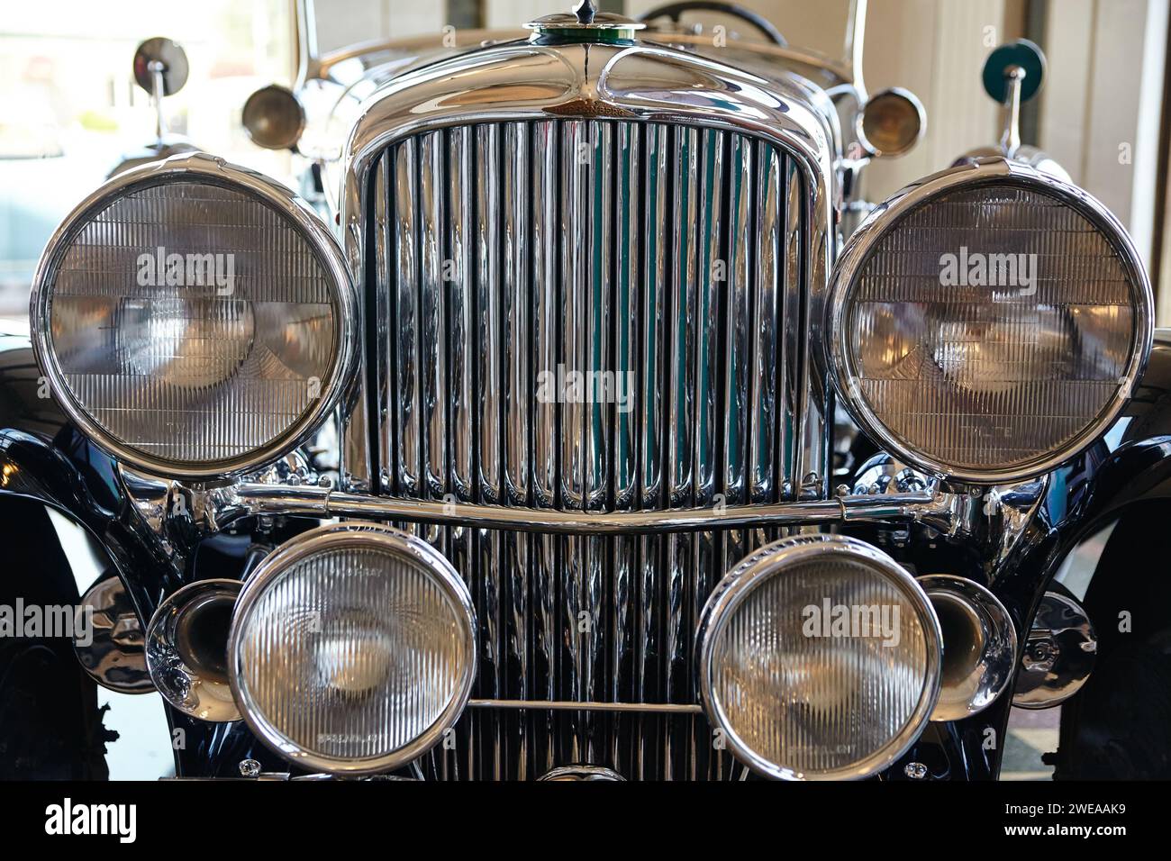 Vintage Car Chrome Grill and Headlights Close-Up Stock Photo