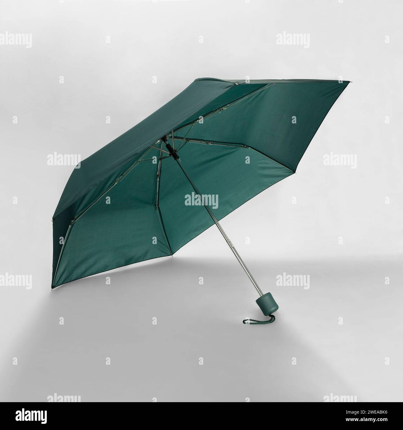 Opened umbrella isolated on white background with clipping path ...