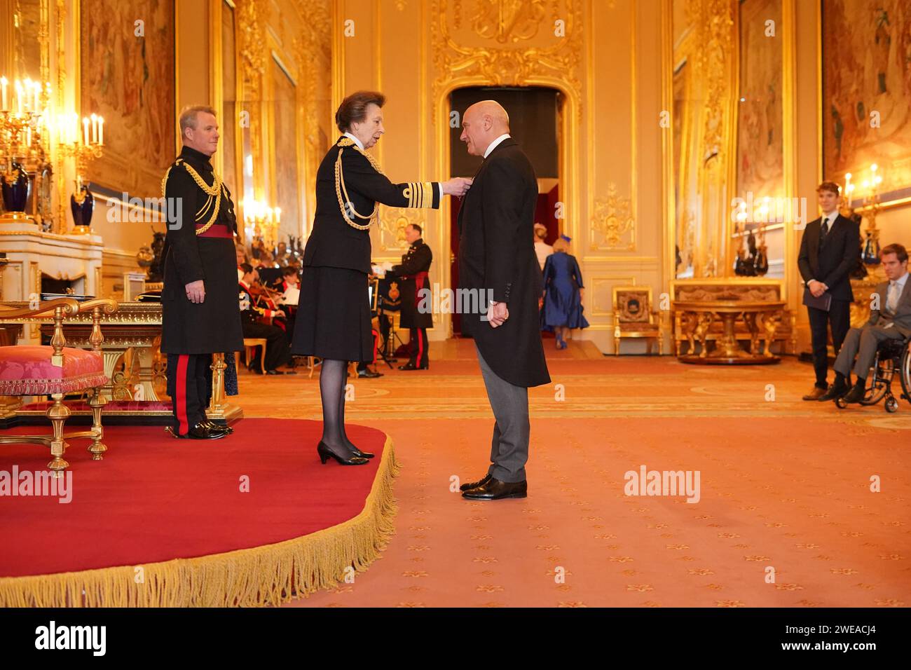 Mr. Simon Daglish, from London, Co-Founder, Walking With The Wounded, and Fundraiser, Tommy's, is made an Officer of the Order of the British Empire by the Princess Royal at Windsor Castle. The honour recognises charitable services. Picture date: Wednesday January 24, 2024. Stock Photo