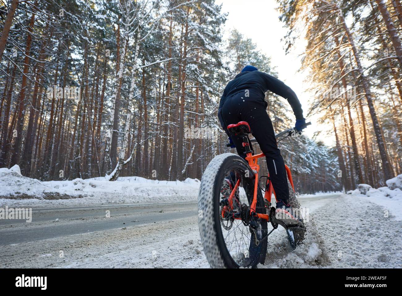 Back view man bike hi-res stock photography and images - Alamy