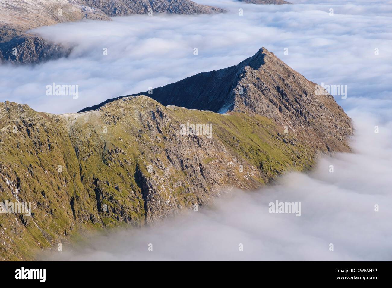 Yr Wydffa, Eryri,  Cloud inversion, on Crib Goch ridge, Snowdonia, North Wales Stock Photo