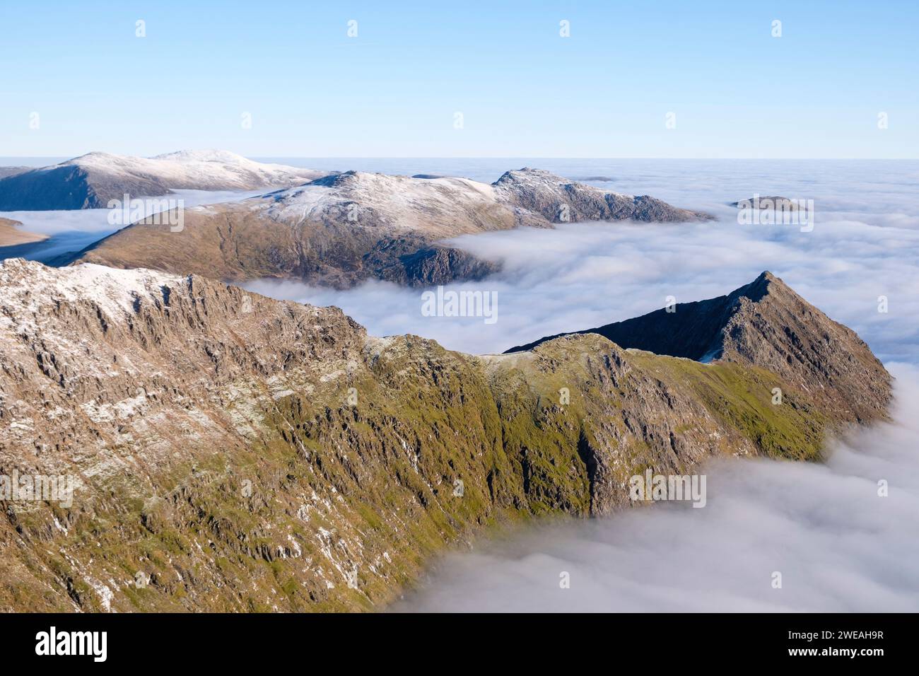 Cloud inversion, on Crib Goch ridge, The Glyderau and Carneddau, mountain ranges of Snowdonia, Eryri, North Wales. Stock Photo