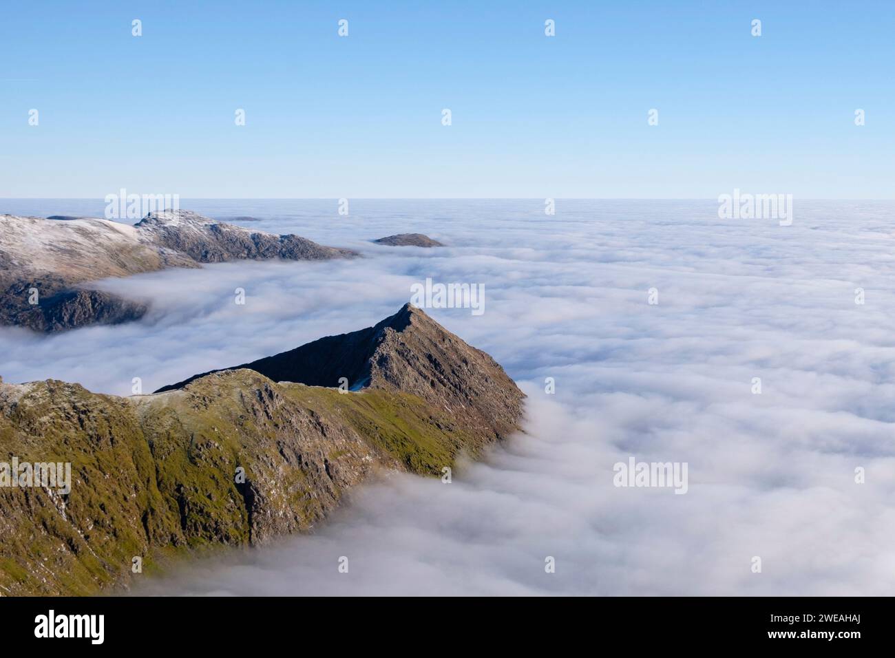 Yr Wydffa, Eryri,  Cloud inversion, on Crib Goch ridge, Snowdonia, North Wales Stock Photo