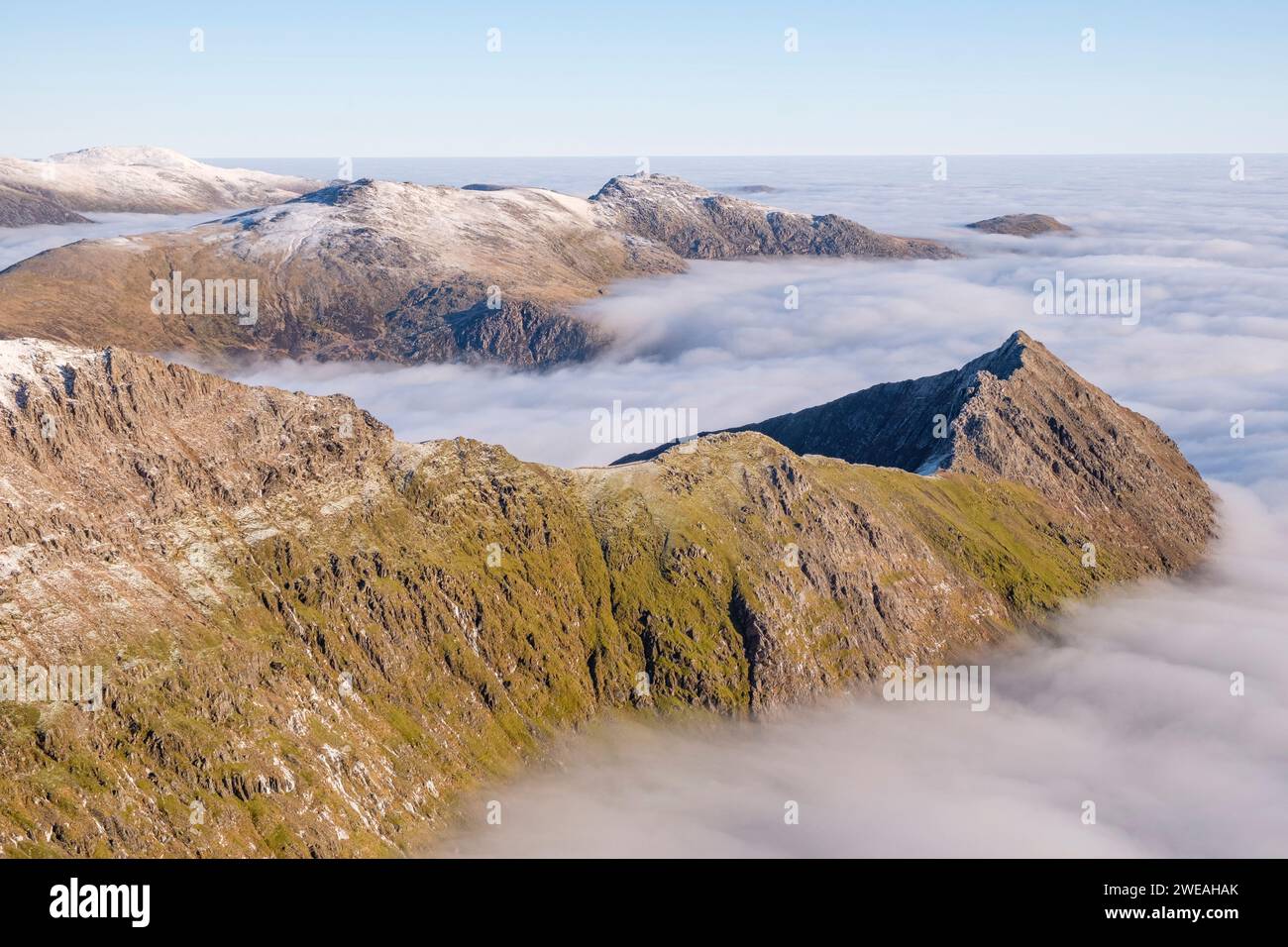 Cloud inversion, on Crib Goch ridge, The Glyderau and Carneddau, mountain ranges of Snowdonia, Eryri, North Wales. Stock Photo