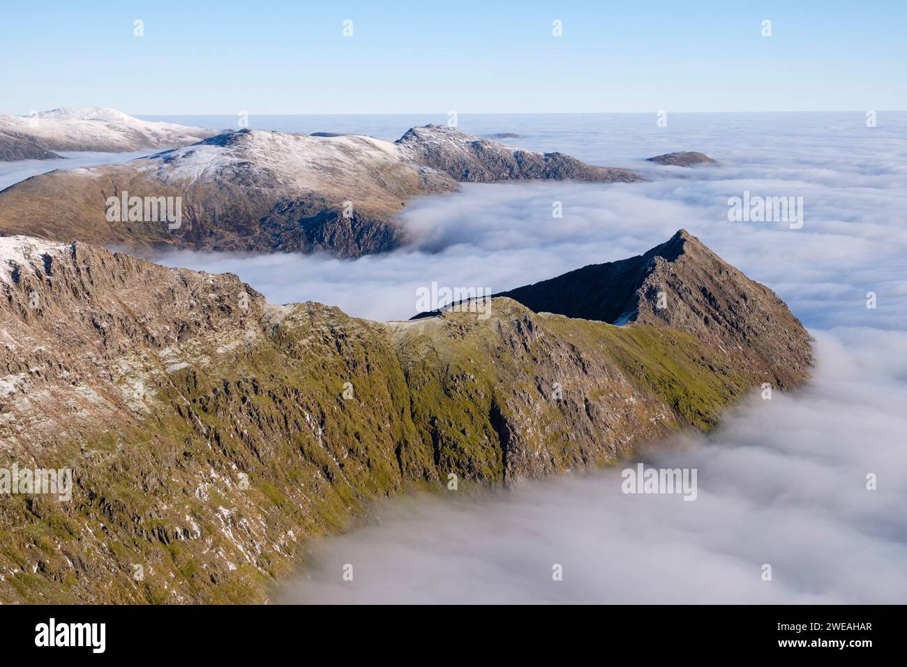 Cloud inversion, on Crib Goch ridge, The Glyderau and Carneddau, mountain ranges of Snowdonia, Eryri, North Wales. Stock Photo