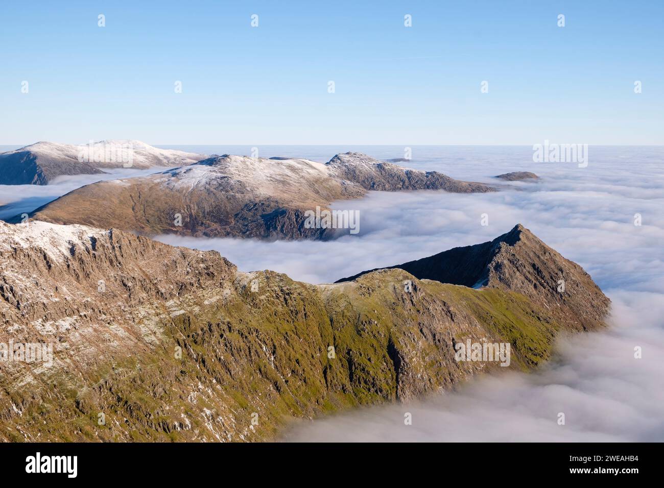 Cloud inversion, on Crib Goch ridge, The Glyderau and Carneddau, mountain ranges of Snowdonia, Eryri, North Wales. Stock Photo