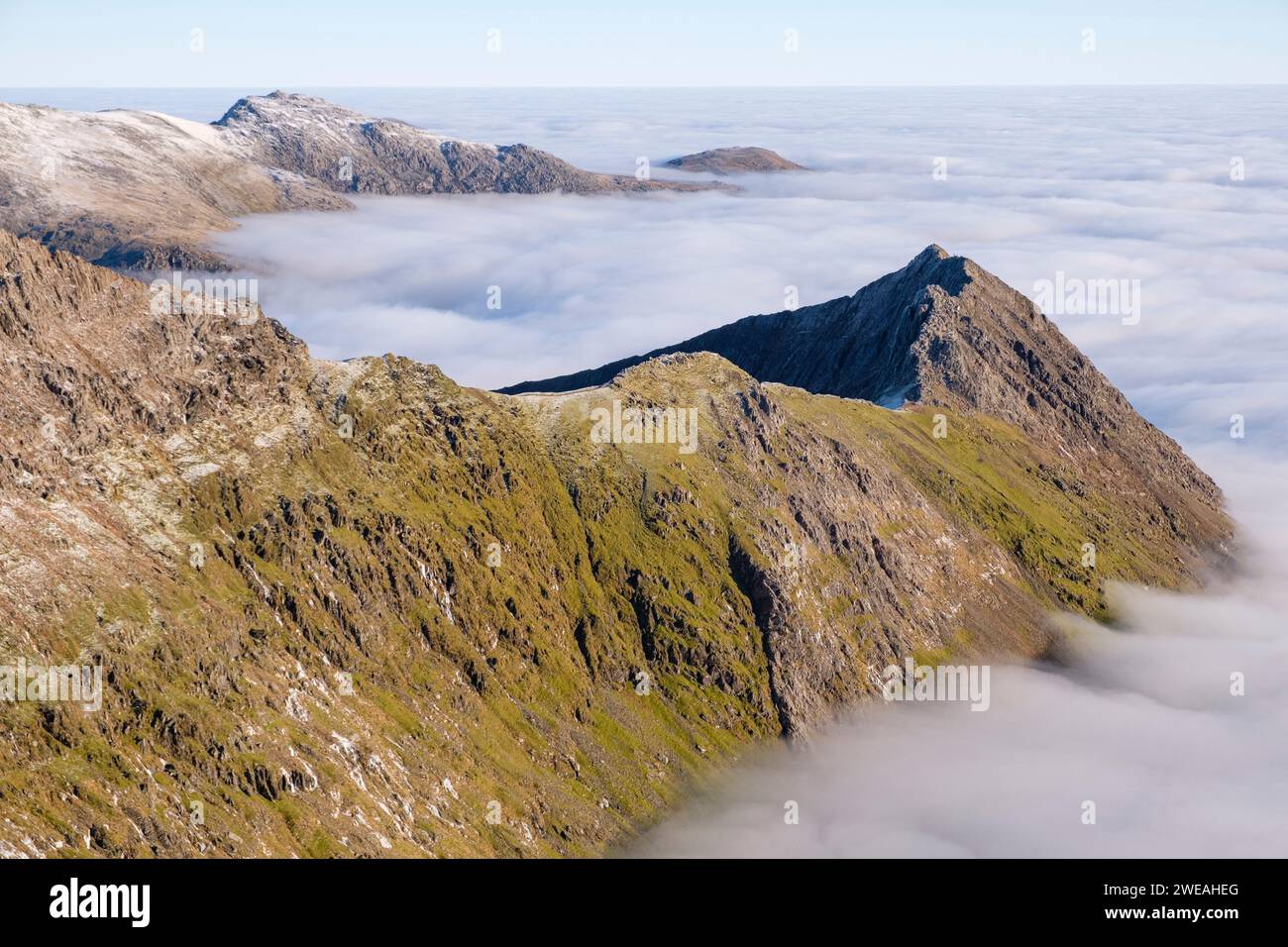 Cloud inversion, on Crib Goch ridge, The Glyderau and Carneddau, mountain ranges of Snowdonia, Eryri, North Wales. Stock Photo