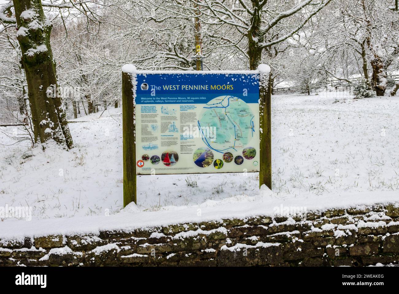 The West Pennine Moors sign covered in snow Stock Photo