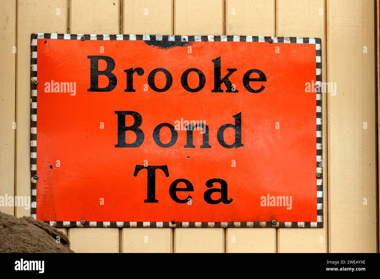 Metal Brooke Bond Tea sign at Rawtenstall Railway station on the East Lancs Railway. Stock Photo