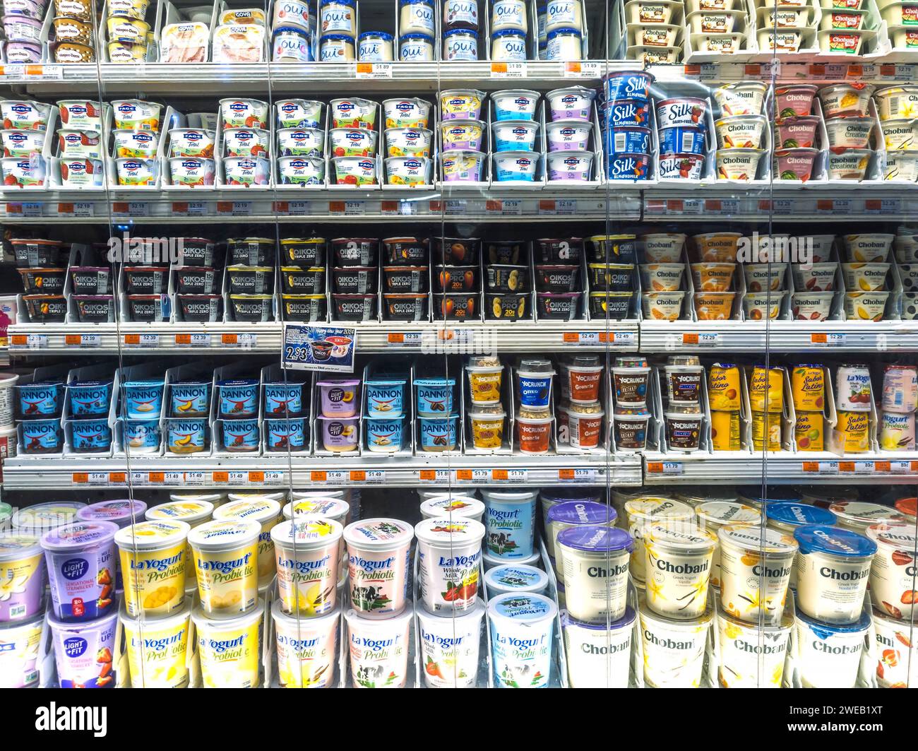 A selection of various brands of yogurt in a supermarket in New York on