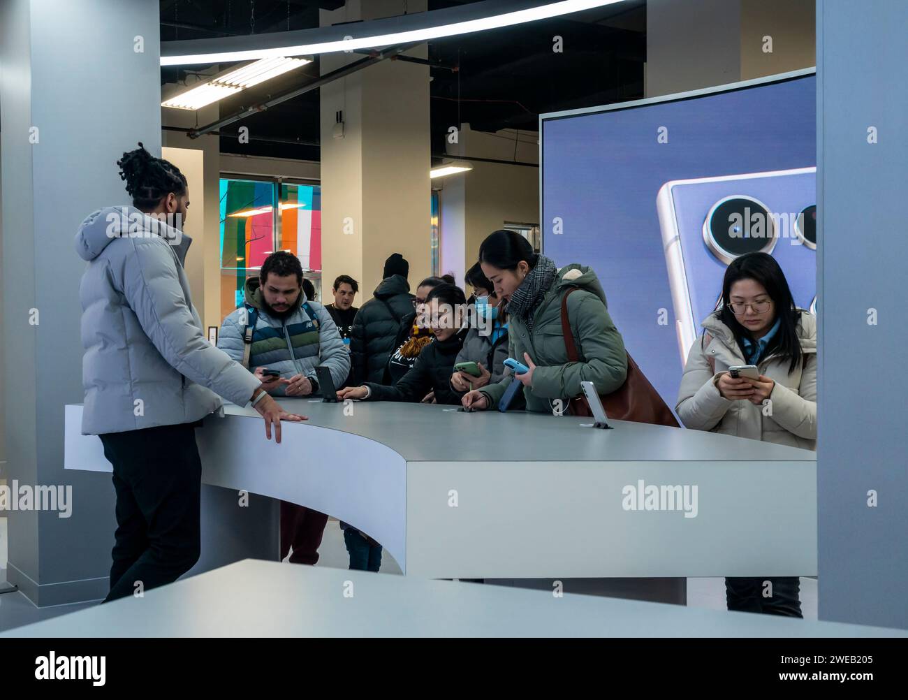 Visitors to the Samsung Galaxy Open Market  in Herald Square in New York admire the Samsung Galaxy S24 Ultra smartphone on Saturday, January 20, 2024. The new smartphone features AI-powered tools. (© Richard B. Levine) Stock Photo