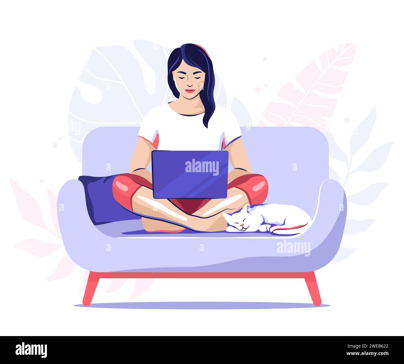 Woman working on a laptop sitting cross-legged on a sofa with a white ...