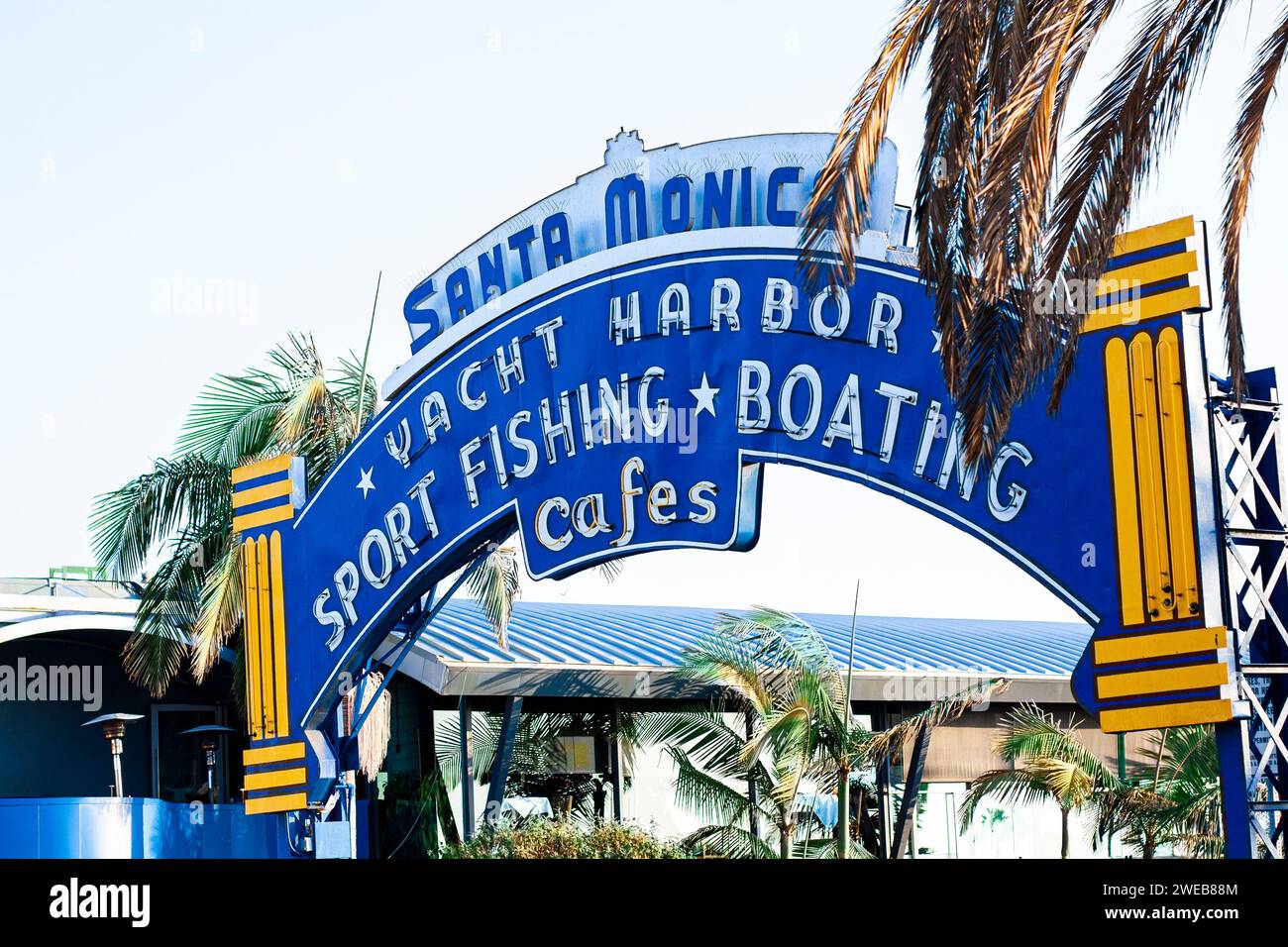 Sign at the entrance to Santa Monica Pier in Santa Monica, California, near Los Angeles. Neon sign for Santa Monica Yacht Harbor. Stock Photo