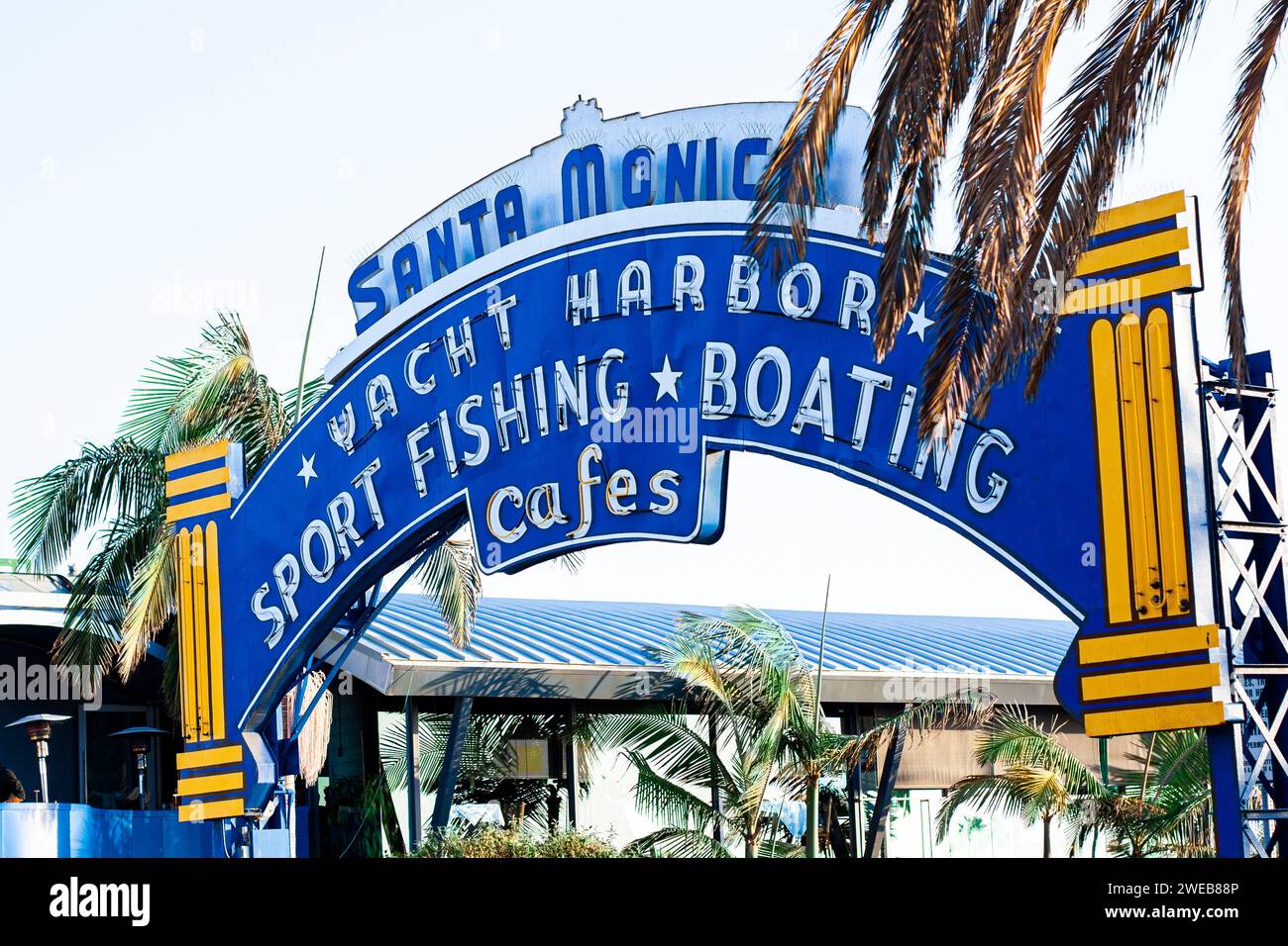 Sign at the entrance to Santa Monica Pier in Santa Monica, California, near Los Angeles. Neon sign for Santa Monica Yacht Harbor. Stock Photo