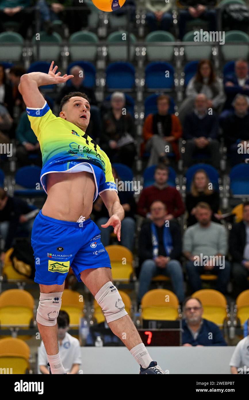 Roeselare, Belgium. 24th Jan, 2024. Romain Vanhelmont (11) of Axis Guibertin smashing the ball