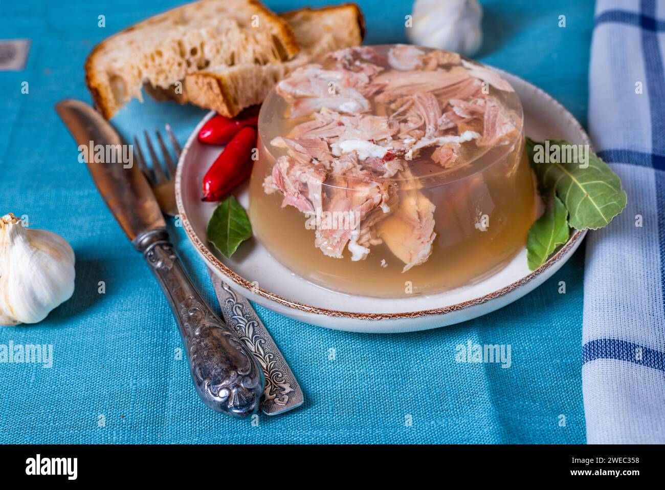 Jelly with meat, beef aspic, traditional dish. portion on plate with