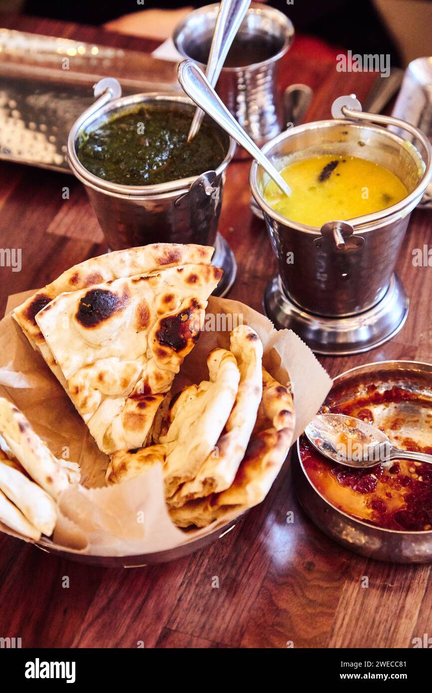 Indian Food on a table in a restaurant in New York Stock Photo
