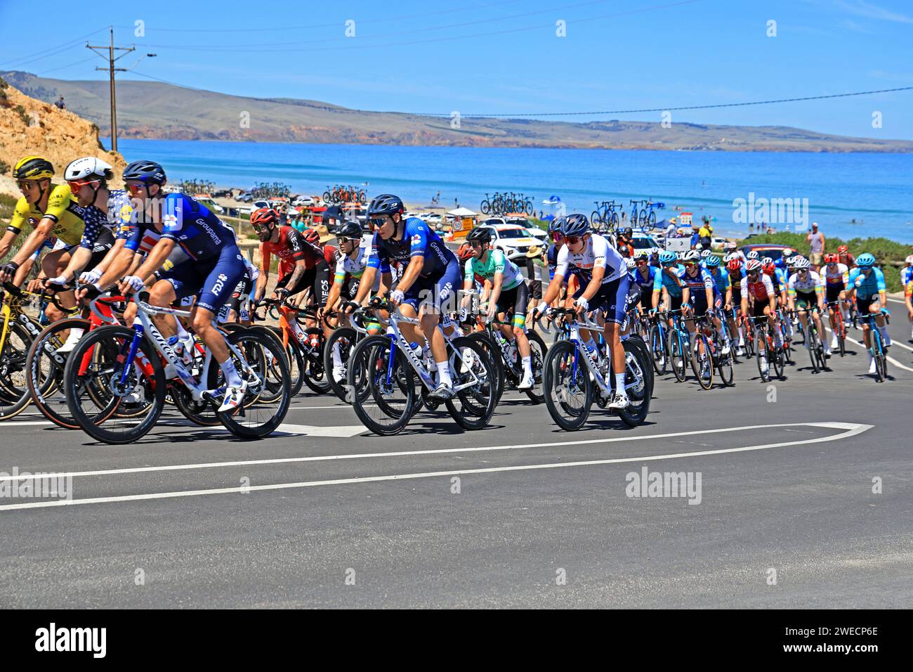 Riders competing during stage 5 of the 2024 Tour Down Under at Aldinga