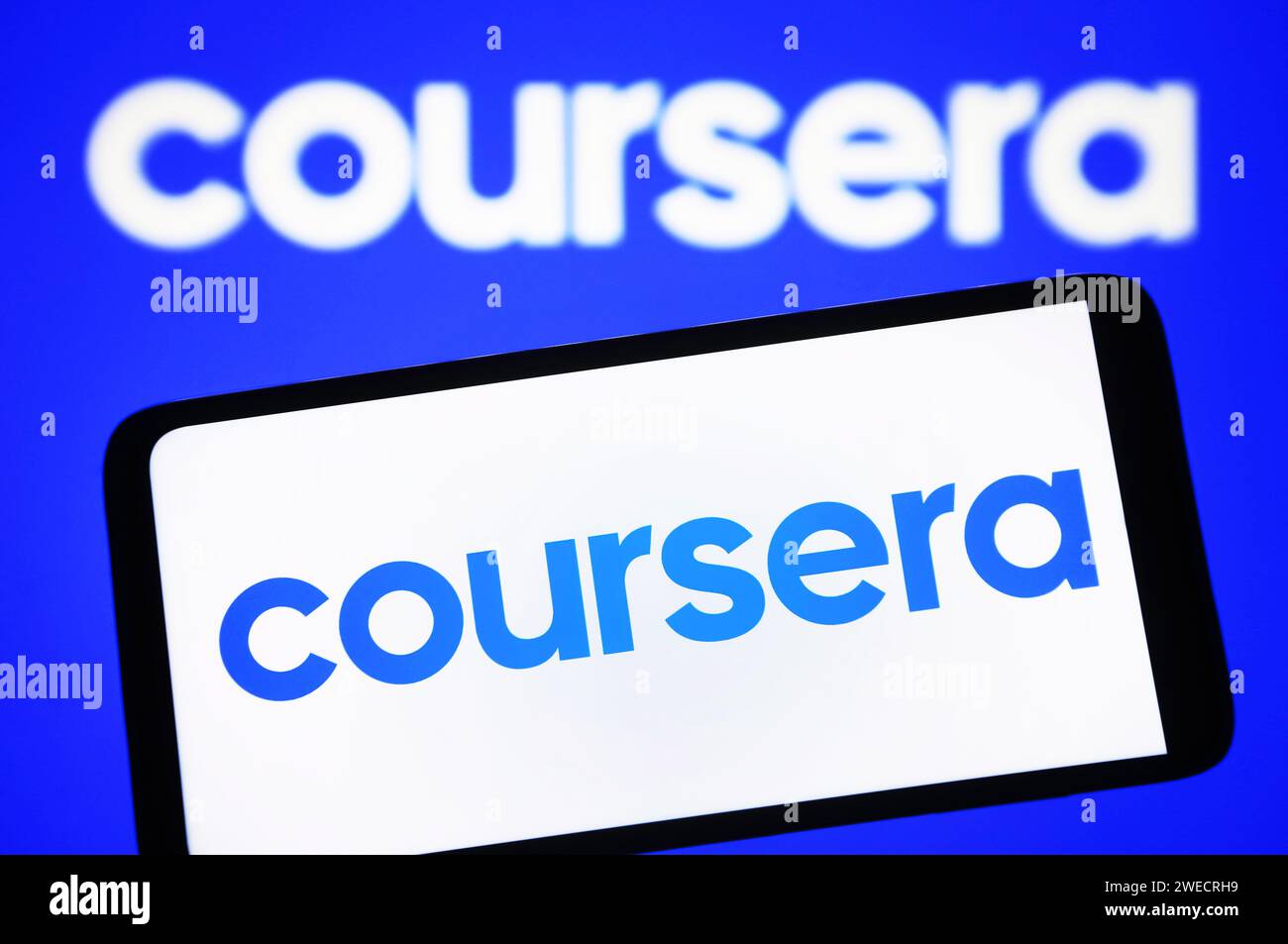 Kyiv, Ukraine. 24th Jan, 2024. In this photo illustration, Coursera Inc. logo is seen on a smartphone and a pc screen. (Photo by Pavlo Gonchar/SOPA Images/Sipa USA) *** Strictly for editorial news purposes only *** Credit: Sipa USA/Alamy Live News Stock Photo