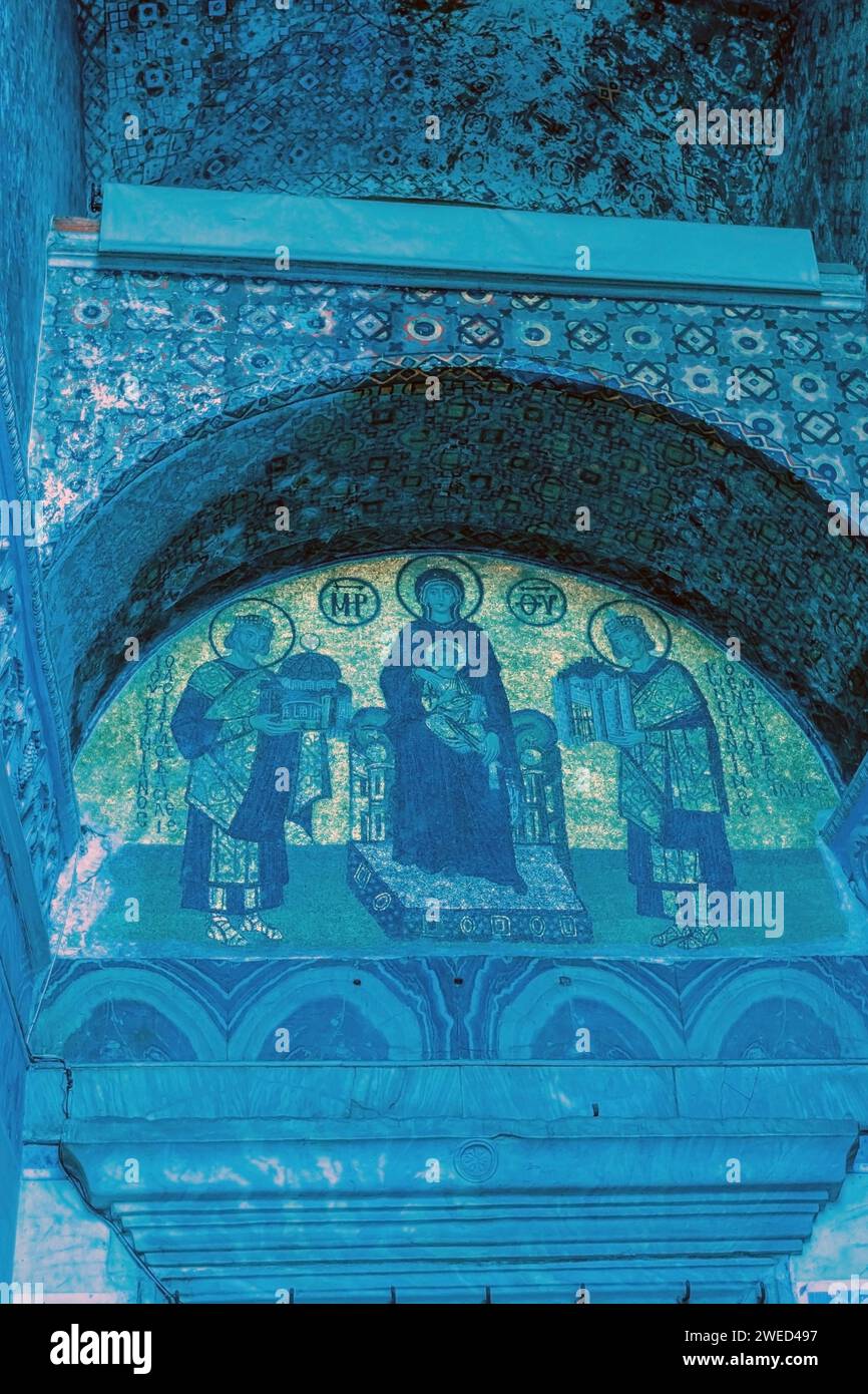 Virgin Mary holding the Christ Child inside Hagia Sophia Mosque. Noise or grain included in Istanbul, Turkiye Stock Photo