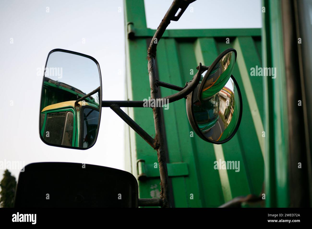 Rear and front view mirror on the truck. Truck window to see the front