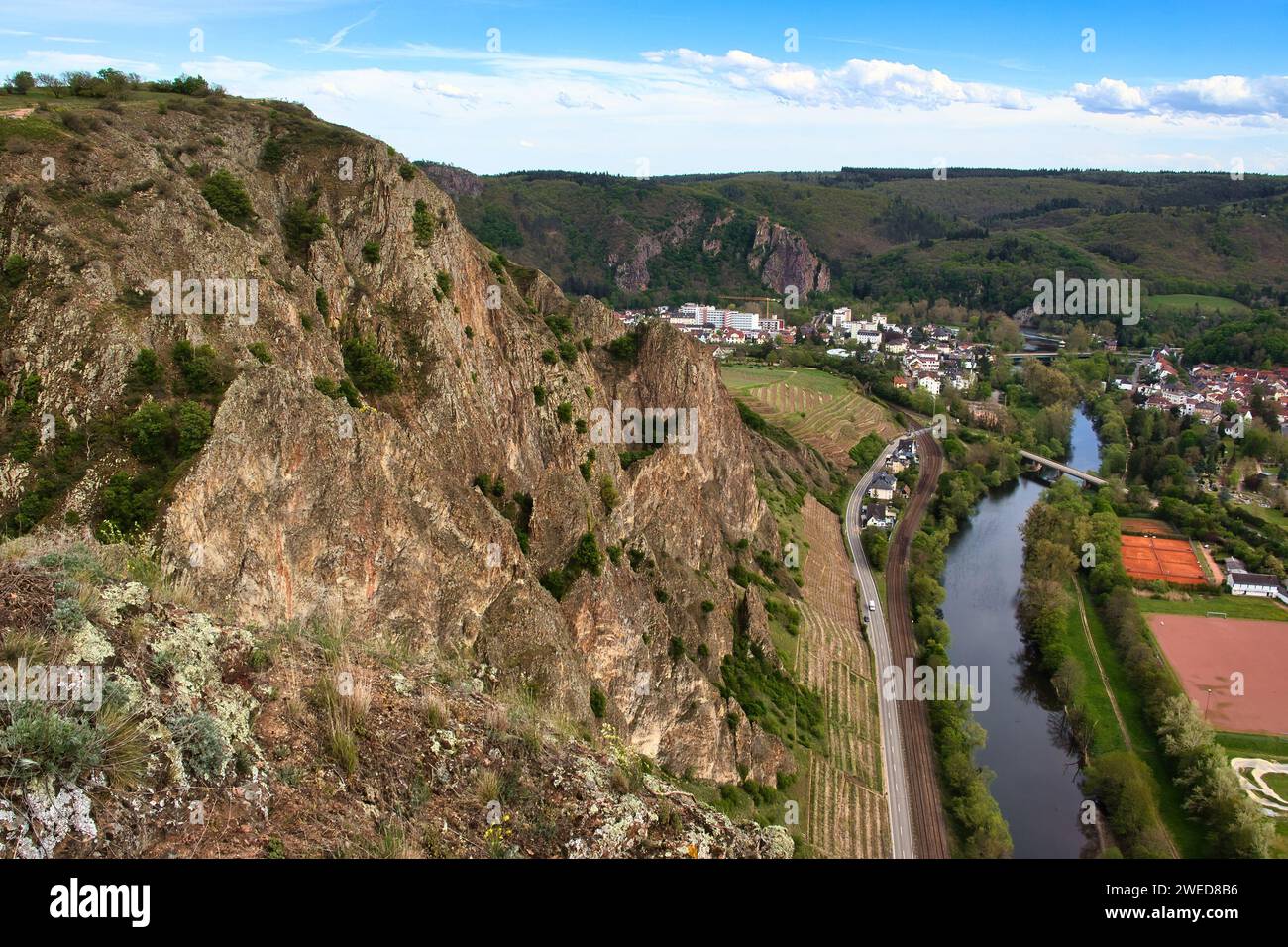 Bad Munster, Germany - May 9, 2021: Nahe River below a cliff at Rotenfels on a spring day in Bad Munster, Germany Stock Photo