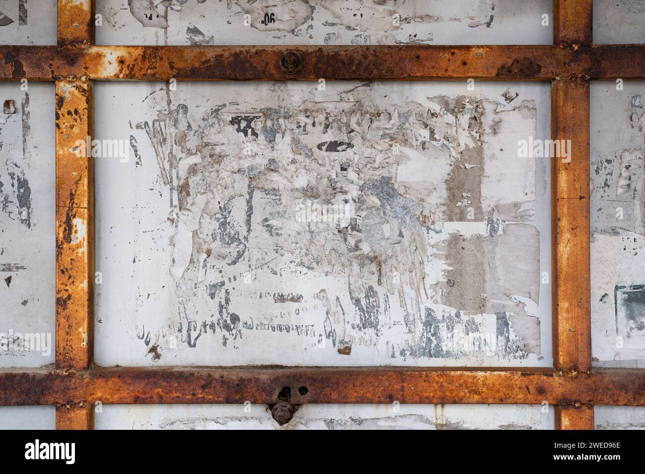 Old rusty advertising board background Stock Photo