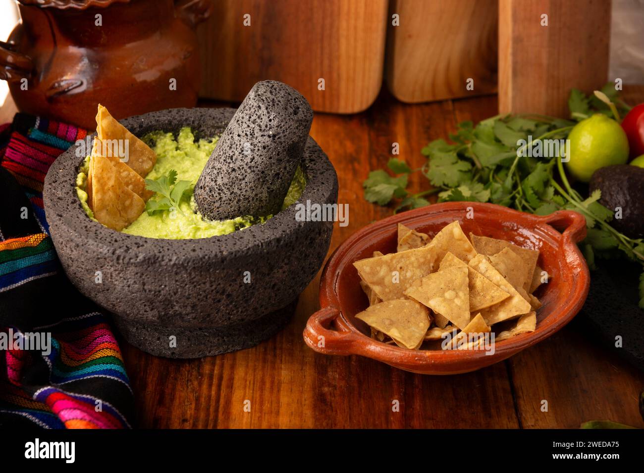 Guacamole. Avocado dip with tortilla chips also called Nachos served in ... Guacamole. Avocado dip with tortilla chips also called Nachos served in ...