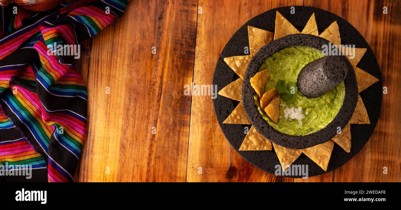 Guacamole. Avocado dip with tortilla chips also called Nachos served in ...