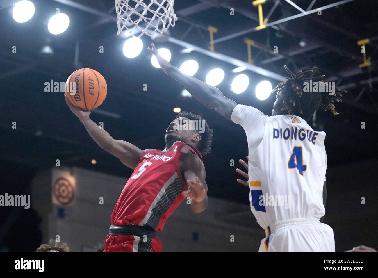 New Mexico guard Jamal Mashburn Jr. (5) drives to the basket against