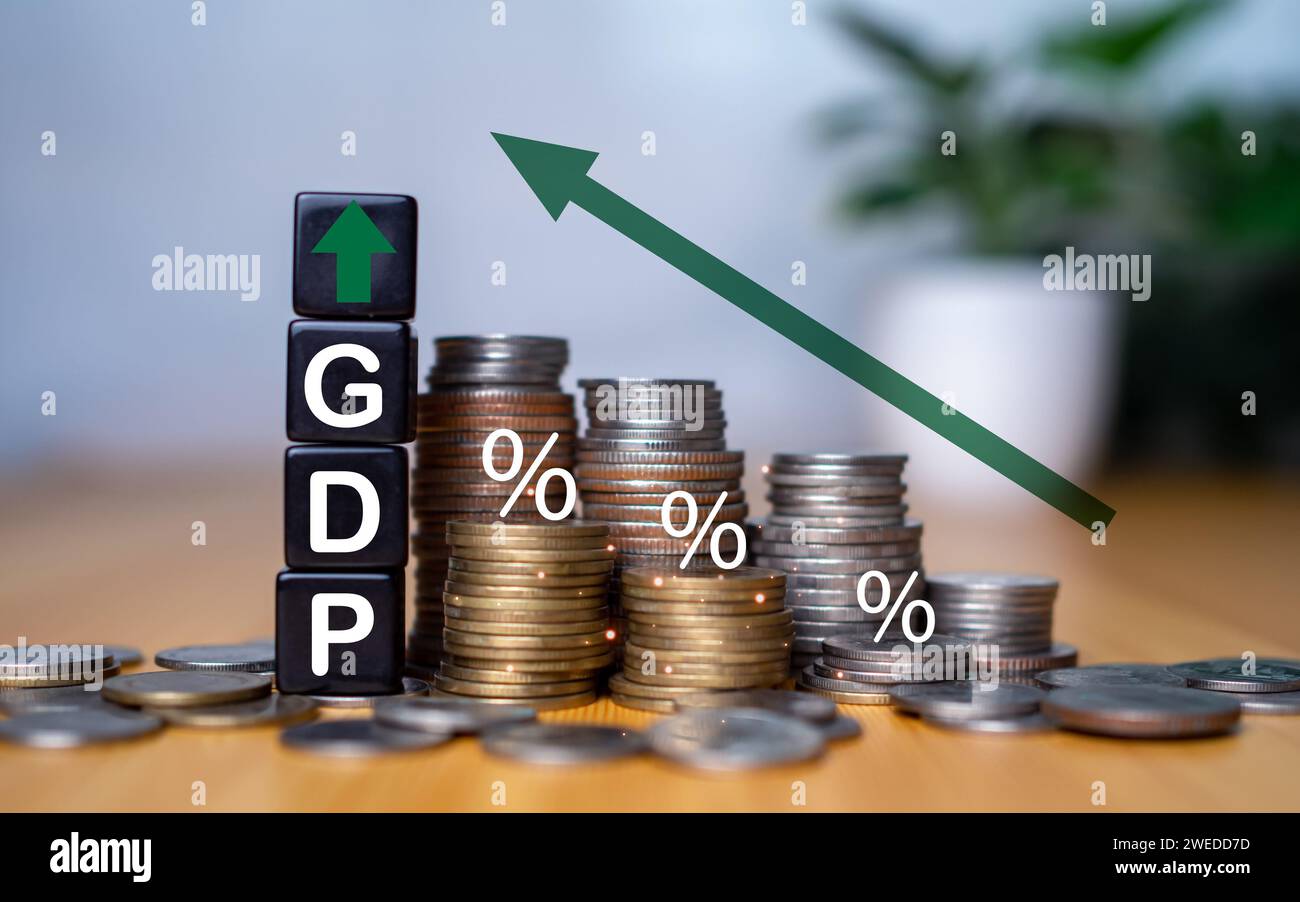 Gross domestic product, Financial, Management, Economic, Inflation, recession and Money concepts, GDP block with Coins stack and UP and Down arrow sym Stock Photo