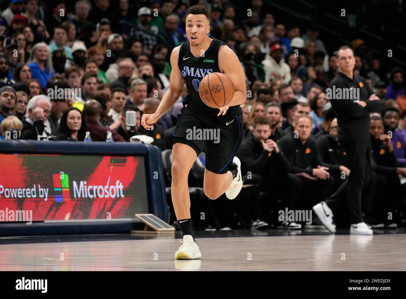 Dallas Mavericks guard Dante Exum advances the ball up court during an