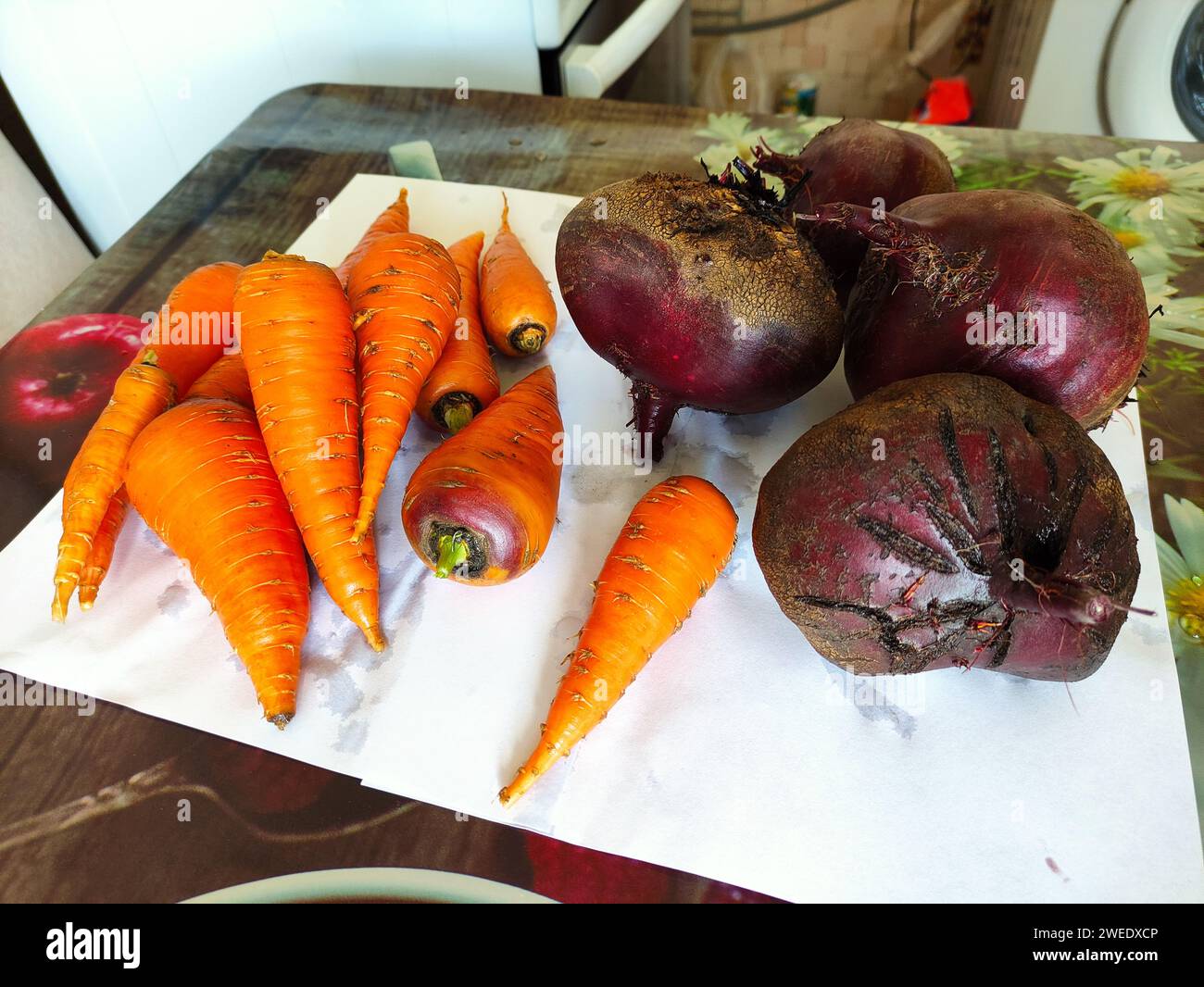 Fresh vegetables carrots and beets on a table Stock Photo