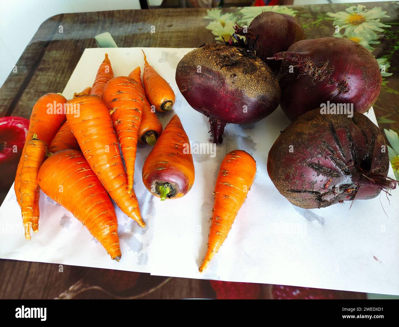 Fresh vegetables carrots and beets on a table Stock Photo