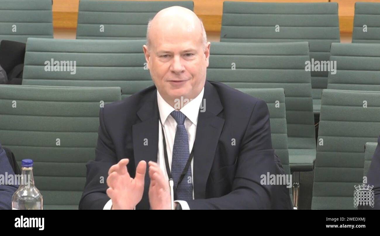 National Highways Chief Executive Nick Harris appearing in front of the Transport Select Committee at the House of Commons, London, to answer questions on the work of National Highways. Picture date: Wednesday January 24, 2024. Stock Photo