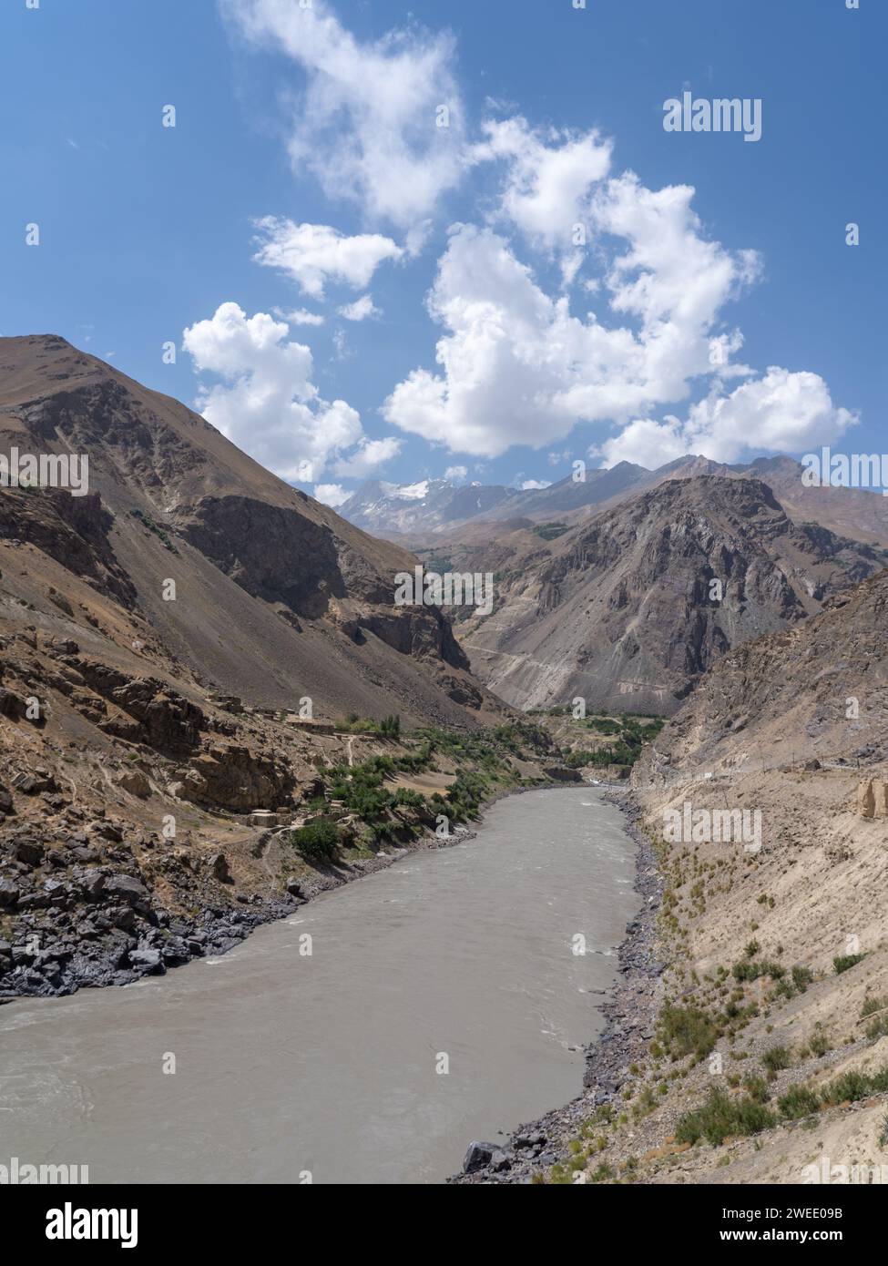 View of the Panj river valley between Tajikistan and Afghanistan from Darvaz district in Gorno-Badakshan, the Pamir mountain region of Tajikistan Stock Photo