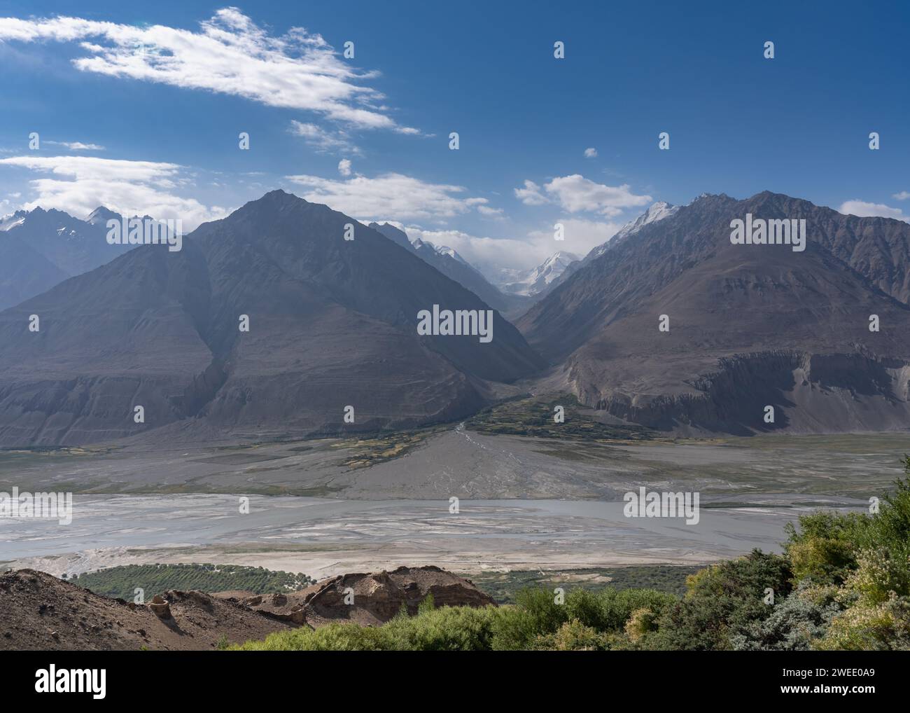 Landscape view from Yamchun fortress on Panj river valley in Wakhan corridor with Afghanistan mountains in background, Gorno-Badakshan, Tajikistan Stock Photo