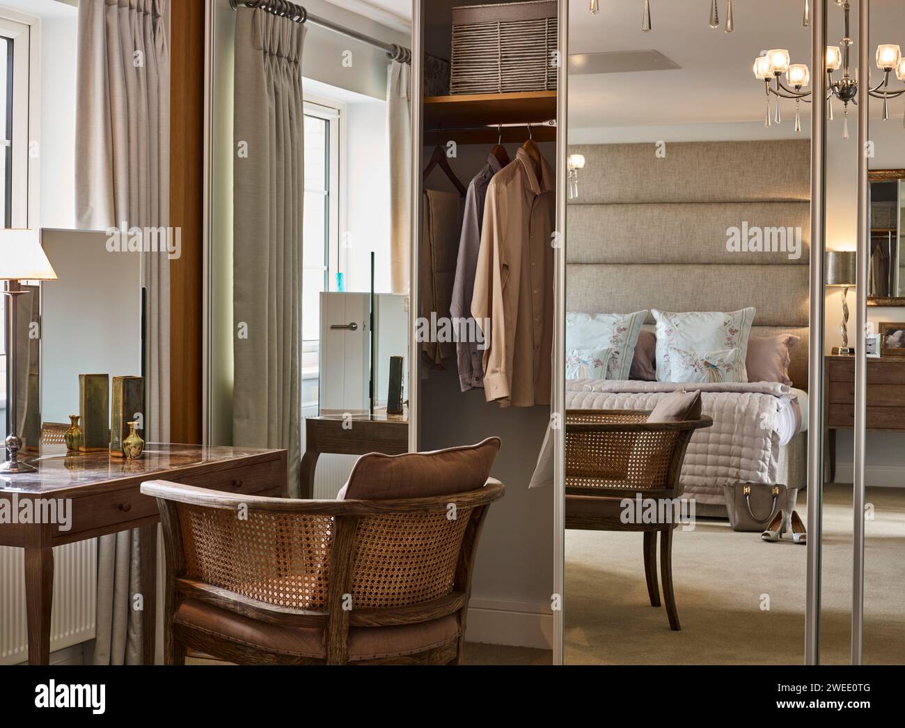 Bedroom with built in cupboards Stock Photo - Alamy