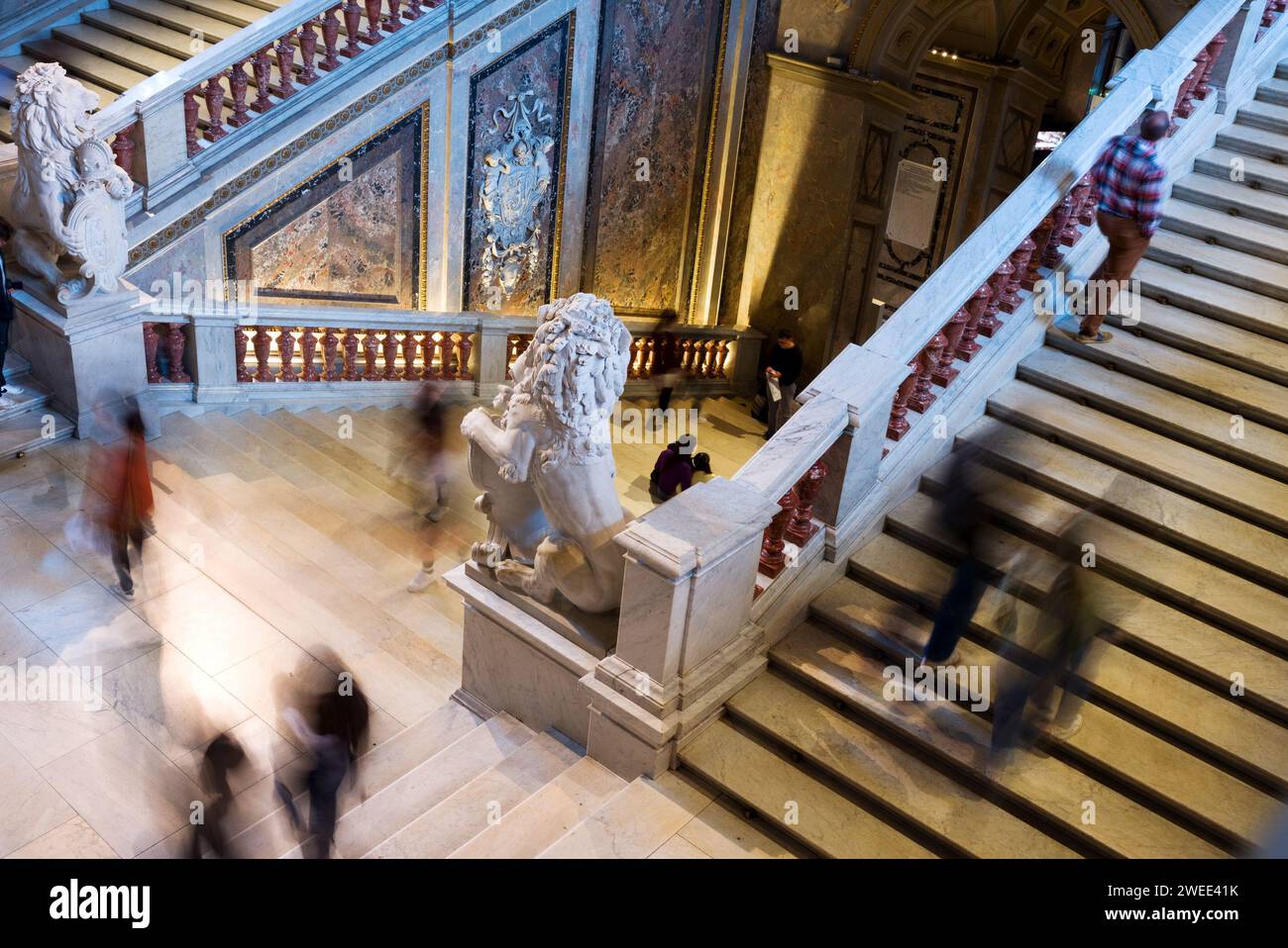 Art history Museum visitors on a staircase Stock Photo